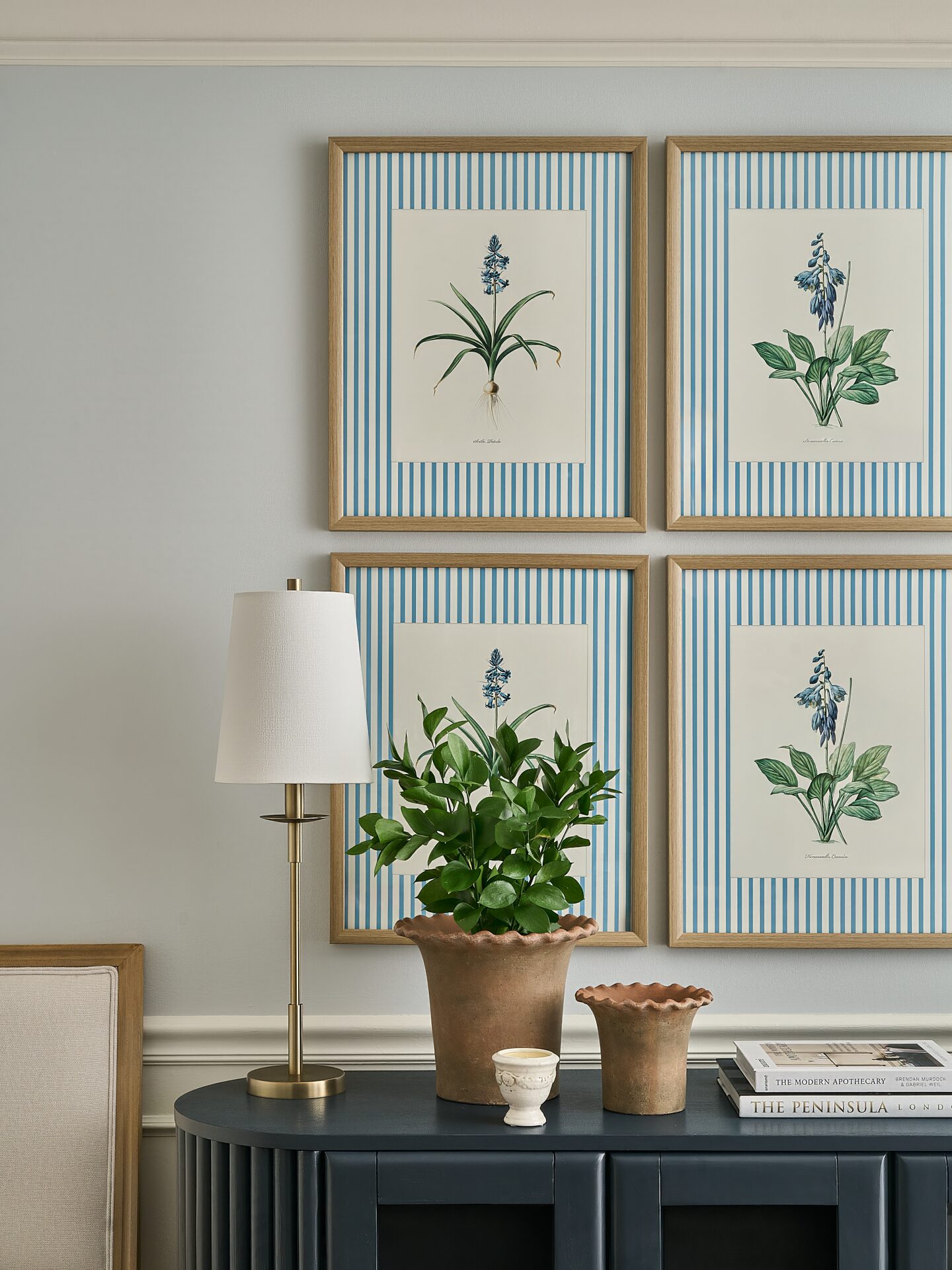 Cranbrook gallery-style art wall with curated framed works