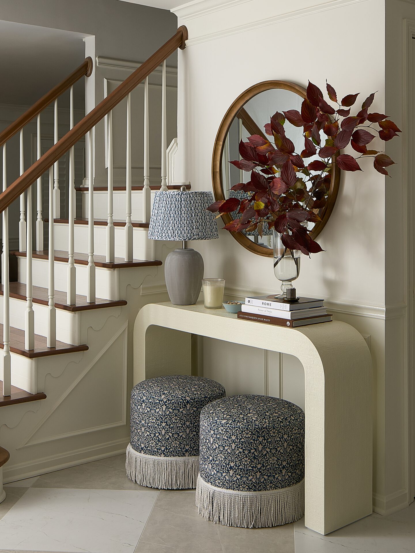 Cranbrook entry foyer with architectural lighting and natural stone floor