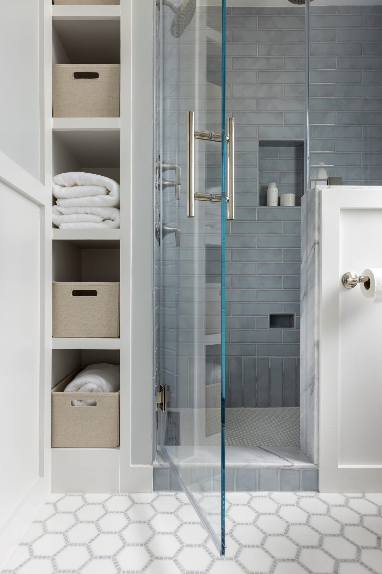 Willowgate shower tile detail with handmade ceramic accent band